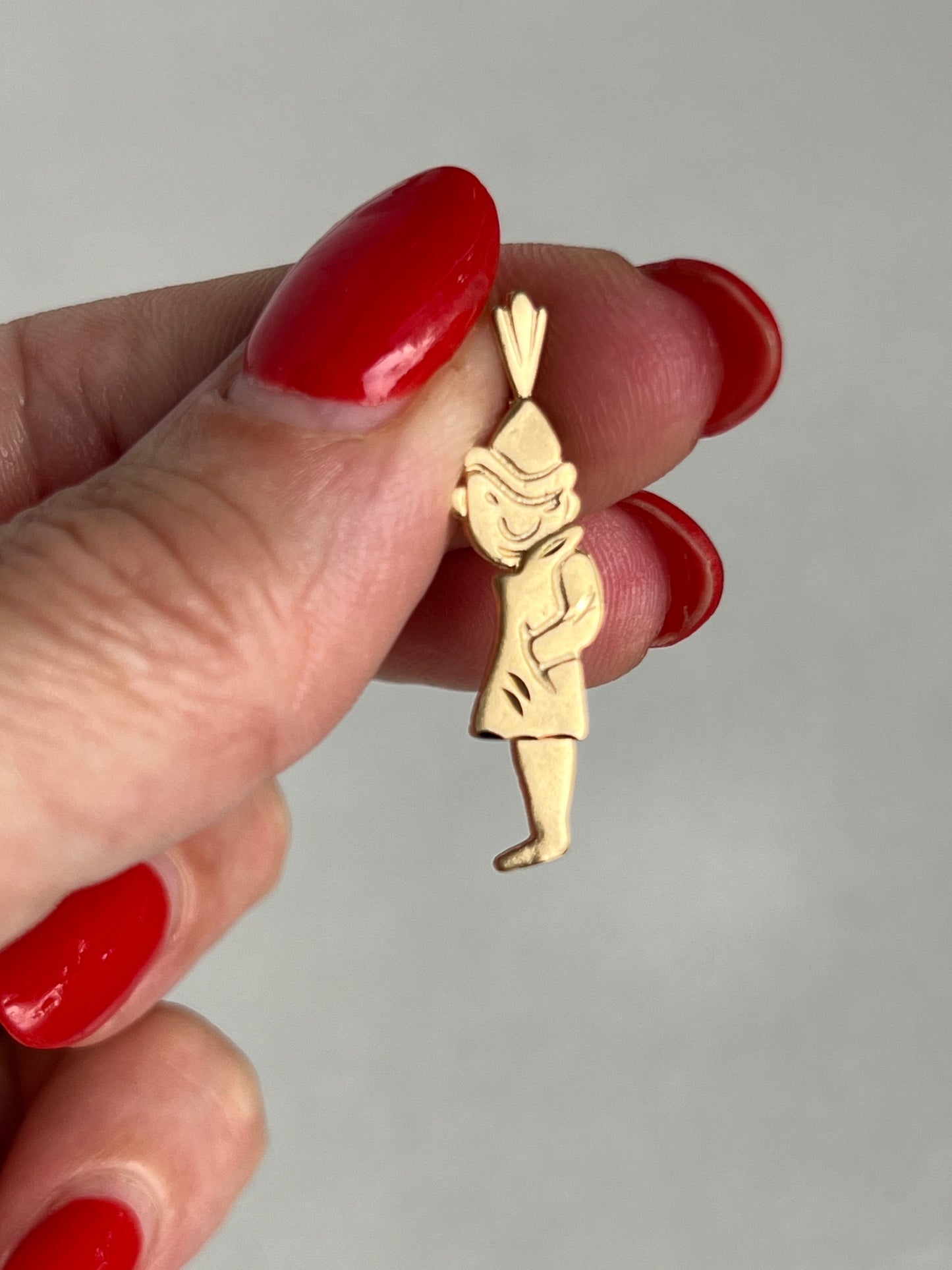Vintage 14k Gold Articulated Flashing Man Charm